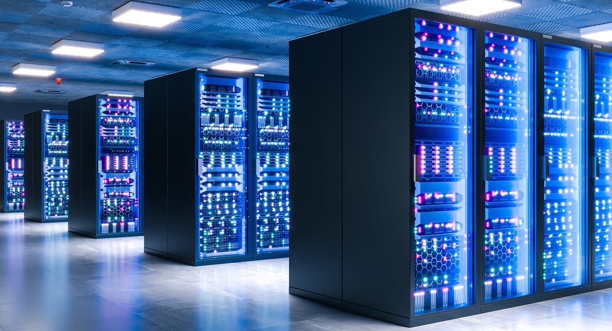 Data center with rows of server racks processing global information and cloud computing